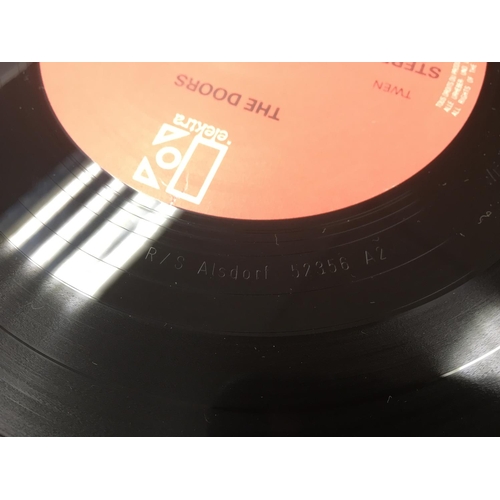 271 - Two LPs by The Doors comprising the self titled debut ELK 42012 and 'The Sift Parade' K 42 079. Both... 