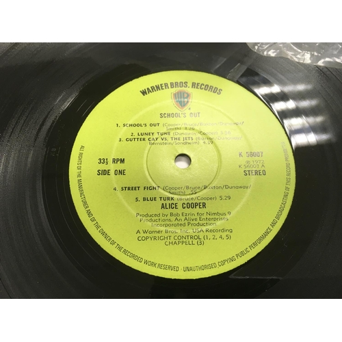 285 - An early pressing of the 'School's Out' LP by Alice Cooper with fold out 'desk' sleeve and original ... 