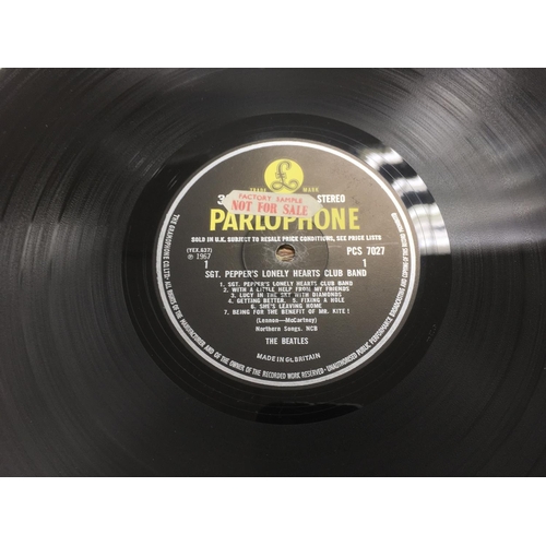 3 - Two Beatles LPs comprising a first UK mono pressing of 'Sergeant Pepper's Lonely Hearts Club Band' w... 
