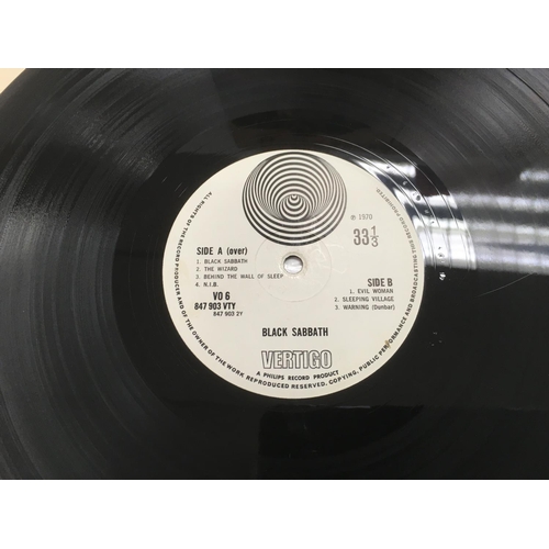302 - A first UK pressing of Black Sabbath's debut LP complete with Vertigo poly lined inner sleeve, a Phi... 