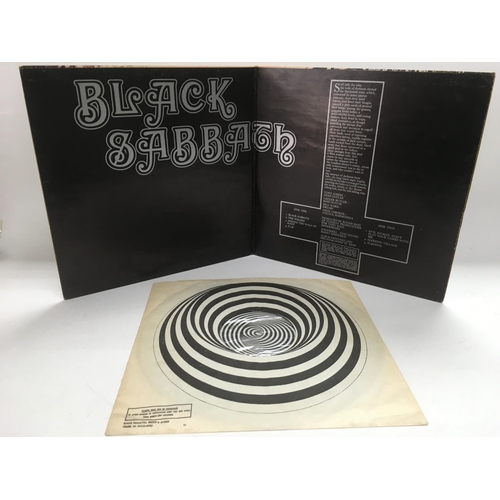 302 - A first UK pressing of Black Sabbath's debut LP complete with Vertigo poly lined inner sleeve, a Phi... 