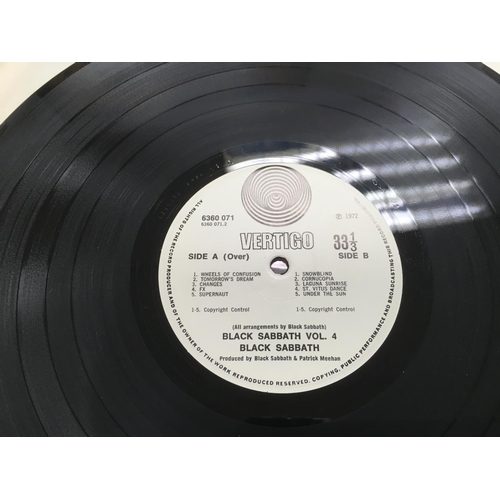 304 - A first UK pressing of 'Vol 4' by Black Sabbath with Vertigo swirl labels, 6360 071, complete with f... 