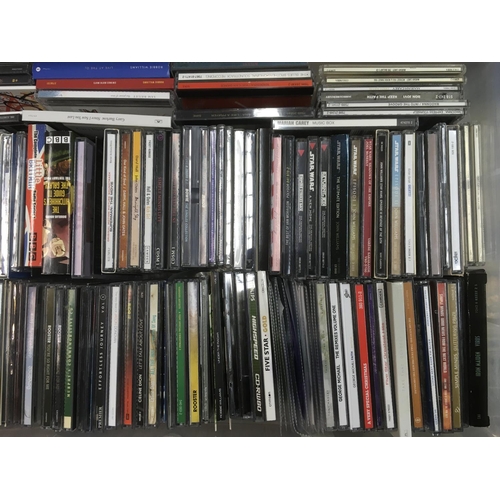 313 - Four boxes of CDs by various artists including Bon Jovi, Madonna, The Beatles and many more.