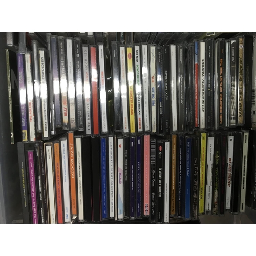 313 - Four boxes of CDs by various artists including Bon Jovi, Madonna, The Beatles and many more.