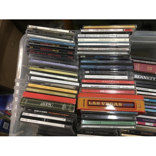 314 - Four boxes of CDs by various artists including The Beatles, Elton John, Guns n Roses and many more.