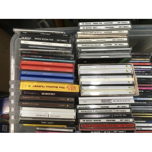 314 - Four boxes of CDs by various artists including The Beatles, Elton John, Guns n Roses and many more.