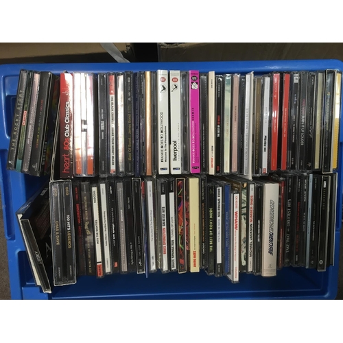 315 - Two boxes if CDs by various artists plus four boxes of DVDs.