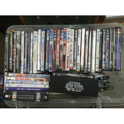 315 - Two boxes if CDs by various artists plus four boxes of DVDs.