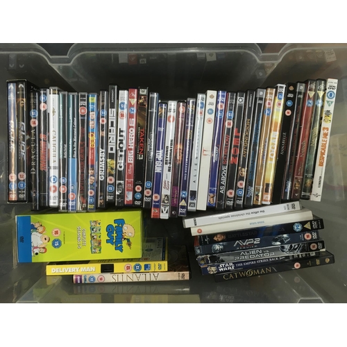 315 - Two boxes if CDs by various artists plus four boxes of DVDs.