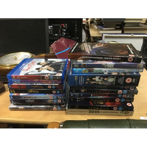 319 - Four boxes of Blu Rays and DVDs including various box sets.