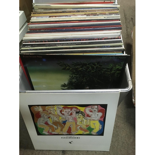 324 - A record case of LPs and 12 inch singles by various artists including Queen, Meat Loaf, Frankie Goes... 
