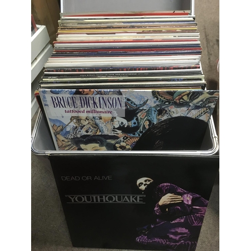 324 - A record case of LPs and 12 inch singles by various artists including Queen, Meat Loaf, Frankie Goes... 