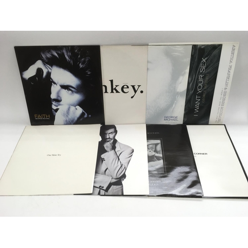 327 - A collection of George Michael 12 inch singles.