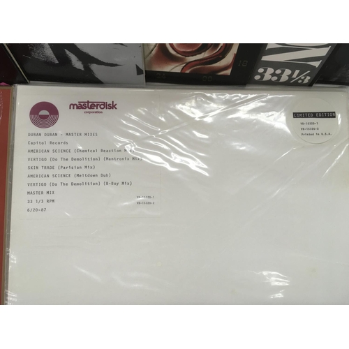 330 - A collection of Duran Duran LPs and 12 inch singles plus related side projects. Also includes Record... 