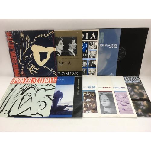 330 - A collection of Duran Duran LPs and 12 inch singles plus related side projects. Also includes Record... 