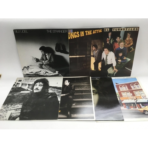 333 - A collection of Billy Joel LPs and 12 inch singles.