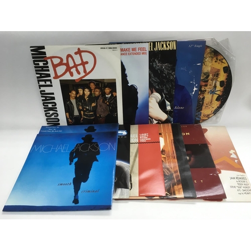 335 - A collection of Michael Jackson, The Jackson 5 and related LPs and 12 inch singles.