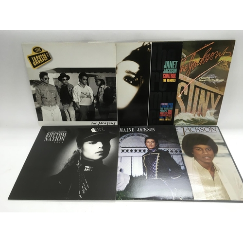 335 - A collection of Michael Jackson, The Jackson 5 and related LPs and 12 inch singles.