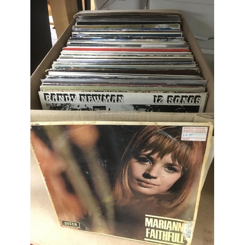 346 - A box of LPs by various artists including Genesis, Roxy Music, Marianne Faithfull and others.