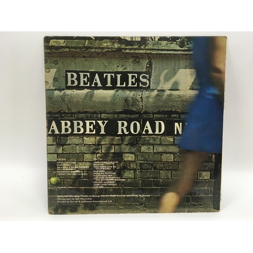 5 - A first UK pressing of The Beatles 'Abbey Road' LP PCS 7088 with misaligned Apple logo on rear sleev... 