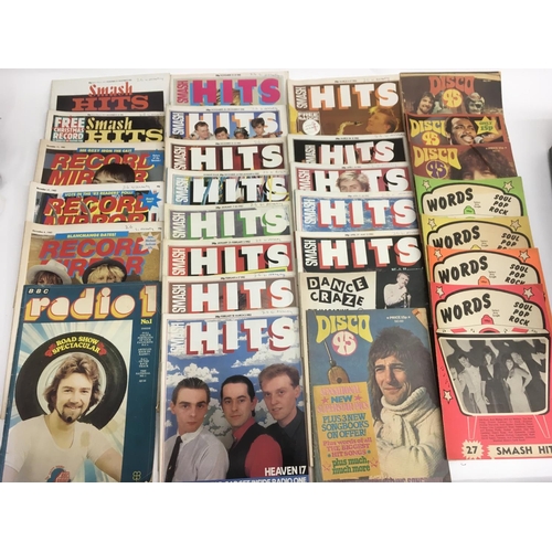 503 - A collection of music magazines, tour programmes and music sheets.