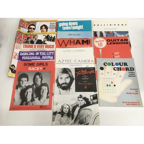 503 - A collection of music magazines, tour programmes and music sheets.