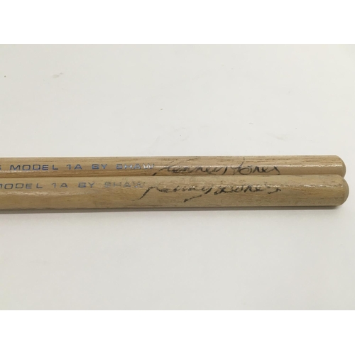 508 - A pair of signed Kenney Jones drumsticks. No provenance available, buyers must ensure they are 100% ... 