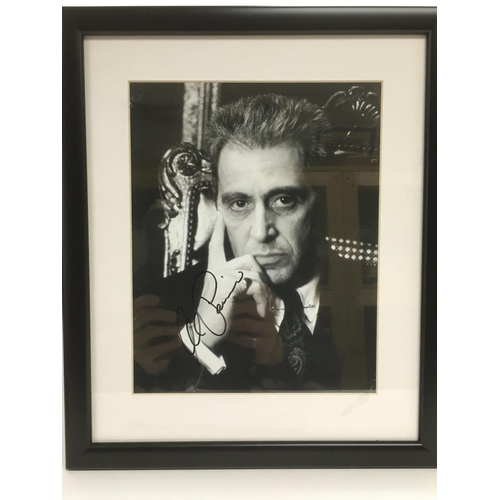 542 - A framed and glazed signed photo of Al Pacino, approx 30.5cm x 36.5cm.