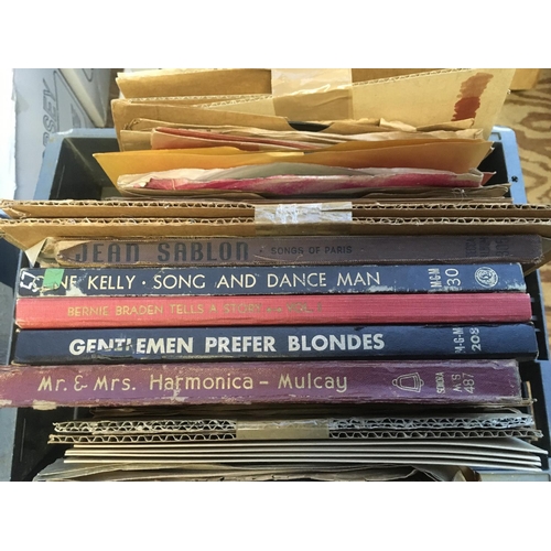 605 - Four boxes of 78 rpm 12 and 10 inch records.