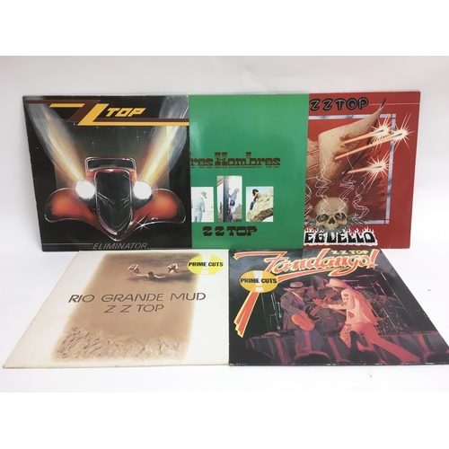 67 - Four ZZ Top LPs including 'Rio Grande Mud', 'Eliminator', 'Tres Hombres' and others.