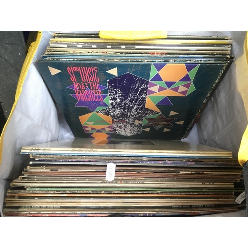 72 - Two bags of LPs and 12 inch singles by various artists including Free, Camel, Van Morrison, Paul McC... 