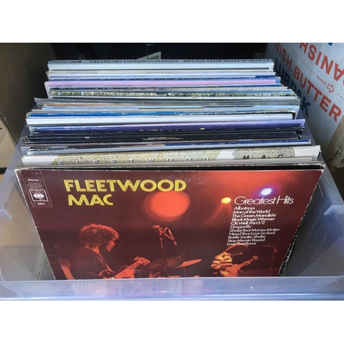 75 - A box containing a collection of LPs by various artists including Kate Bush, Rolling Stones, Fleetwo... 