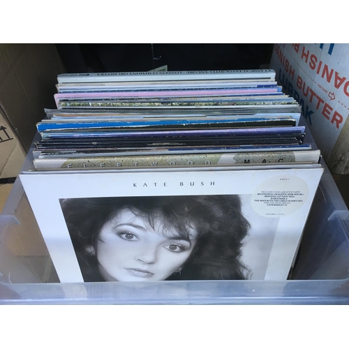 75 - A box containing a collection of LPs by various artists including Kate Bush, Rolling Stones, Fleetwo... 