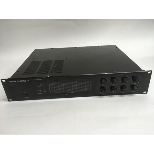 A Yamaha DMP7 digital mixing processor and a Yamaha AD8X 8CH AD