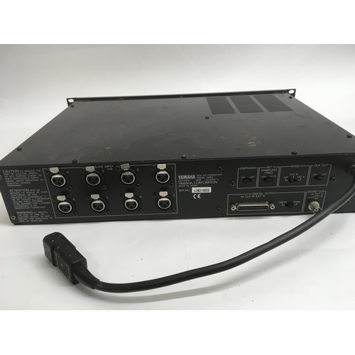 A Yamaha DMP7 digital mixing processor and a Yamaha AD8X 8CH