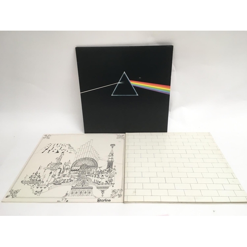 83 - Three Pink Floyd LPs including 'Dark Side Of The Moon', 'The Wall' and 'Relics'.