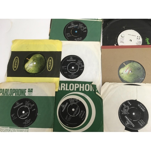 87 - A collection of Beatles and related LPs, EPs and 7 inch singles.