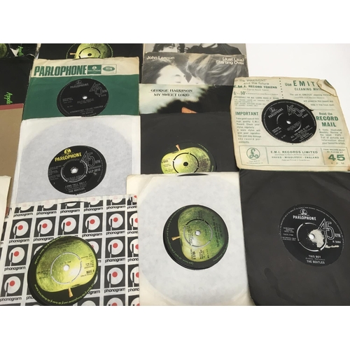 87 - A collection of Beatles and related LPs, EPs and 7 inch singles.