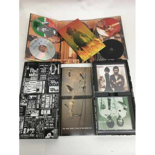 97 - Two 4CD box sets comprising 'Bonfire' by AC/DC and 'Thirty Years Of Maximum R&B' by The Who.