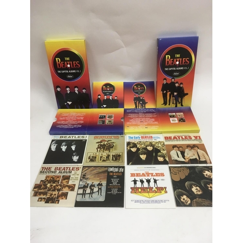 99 - Two CD box sets of The Beatles 'The Capitol Albums Volumes 1&2' with associated booklets.