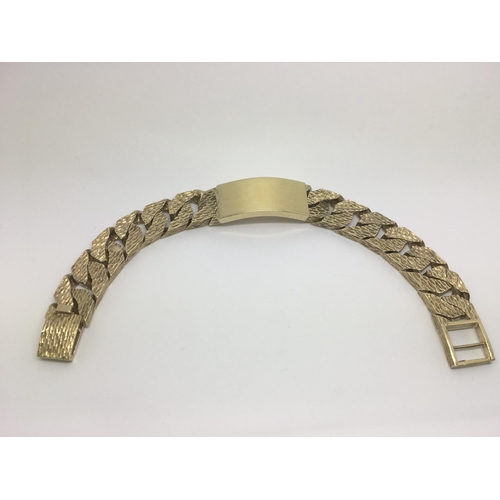 93 - A heavy silver gilt bracelet.