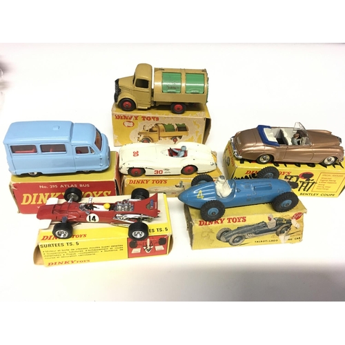 1937 - A Dinky Autobus Atlas #295,a Refuse Wagon # 252, A Surtees Ts.5 #1433, a Mercedes Benz Racing car #2... 