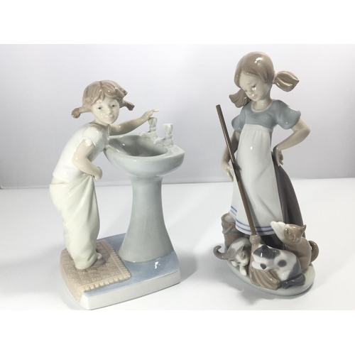 1104 - A Lladro figure a young girl the morning wash and one other Lladro figure a girl with a broom and ki... 