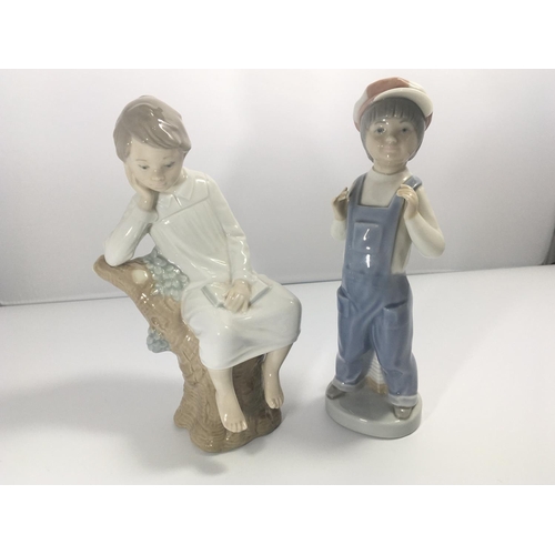 1111 - Two Lladro figures  of children. Height 22cm no damage.