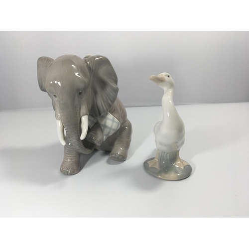 1112 - A Lladro figure of an elephant with bandaged leg and a figure of a duck Hight 14cm (2) no damage.