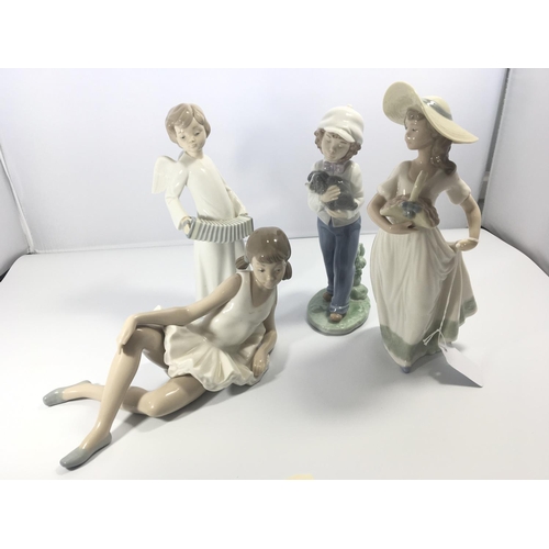 1118 - A collection of four Nao porcelain figures (one repaired)  Height 22cm (4)