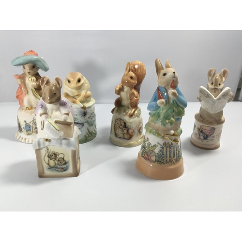 1131 - A collection of six Royal Worcester Peter Rabbit limited Edtion and numbered Celebration candle snuf... 