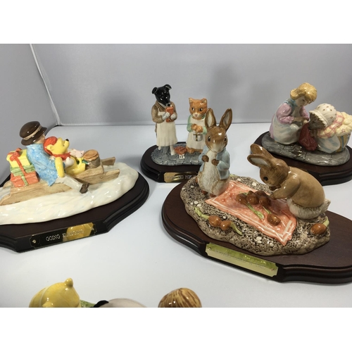 1141 - A collection of limited edition Royal Doulton and Beswick winne the Pooh collection figures on hard ... 