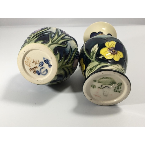 1142 - Two modern Moorcroft vases decorated with flowers signed bases height 13cm. No damage. (2)