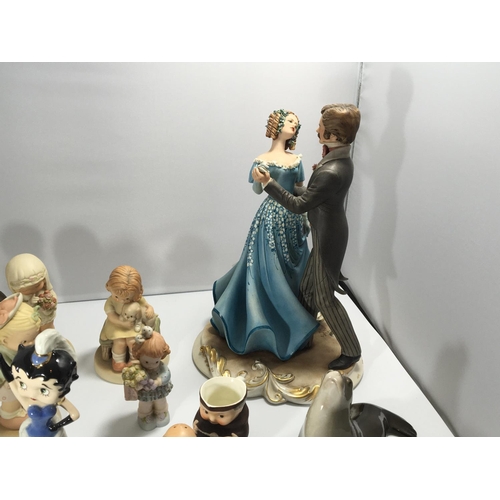 1228 - A collection of ceramics including Lucie Attwell figures Goebel and a Capodimonte limited edition da... 